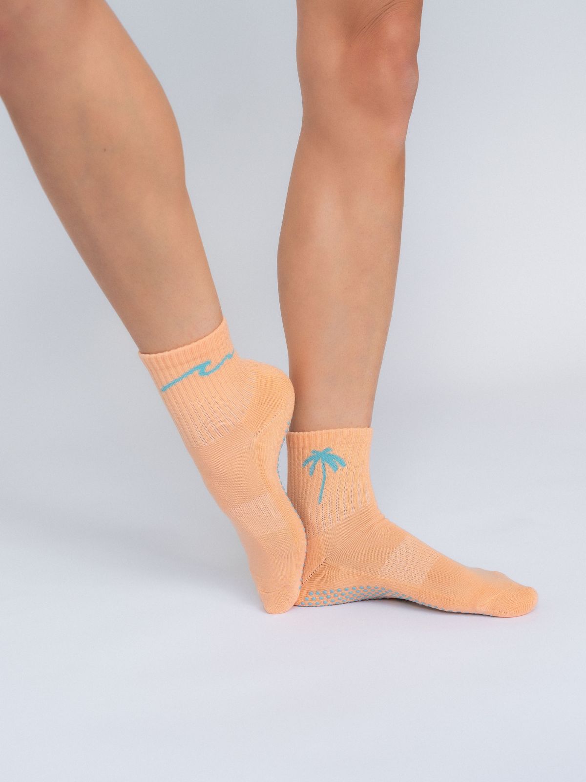 Women's non-slip grip socks for Pilates and yoga – peach color with palm tree and wave