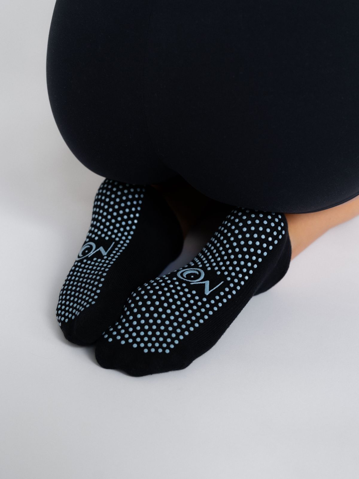 Non-slip Women's short  grip socks for Pilates and yoga – black with blue grip