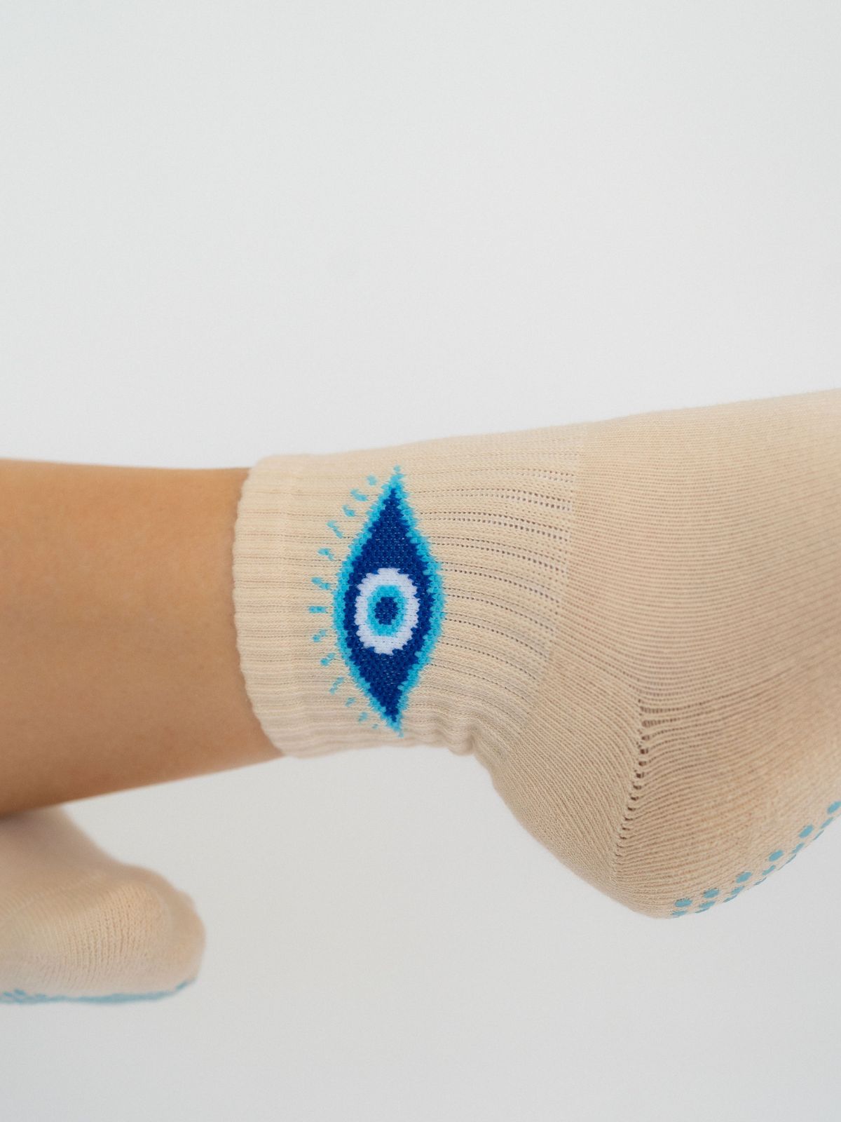 Evil eye logo  Pilates  and yoga creamy non-slip grip socks