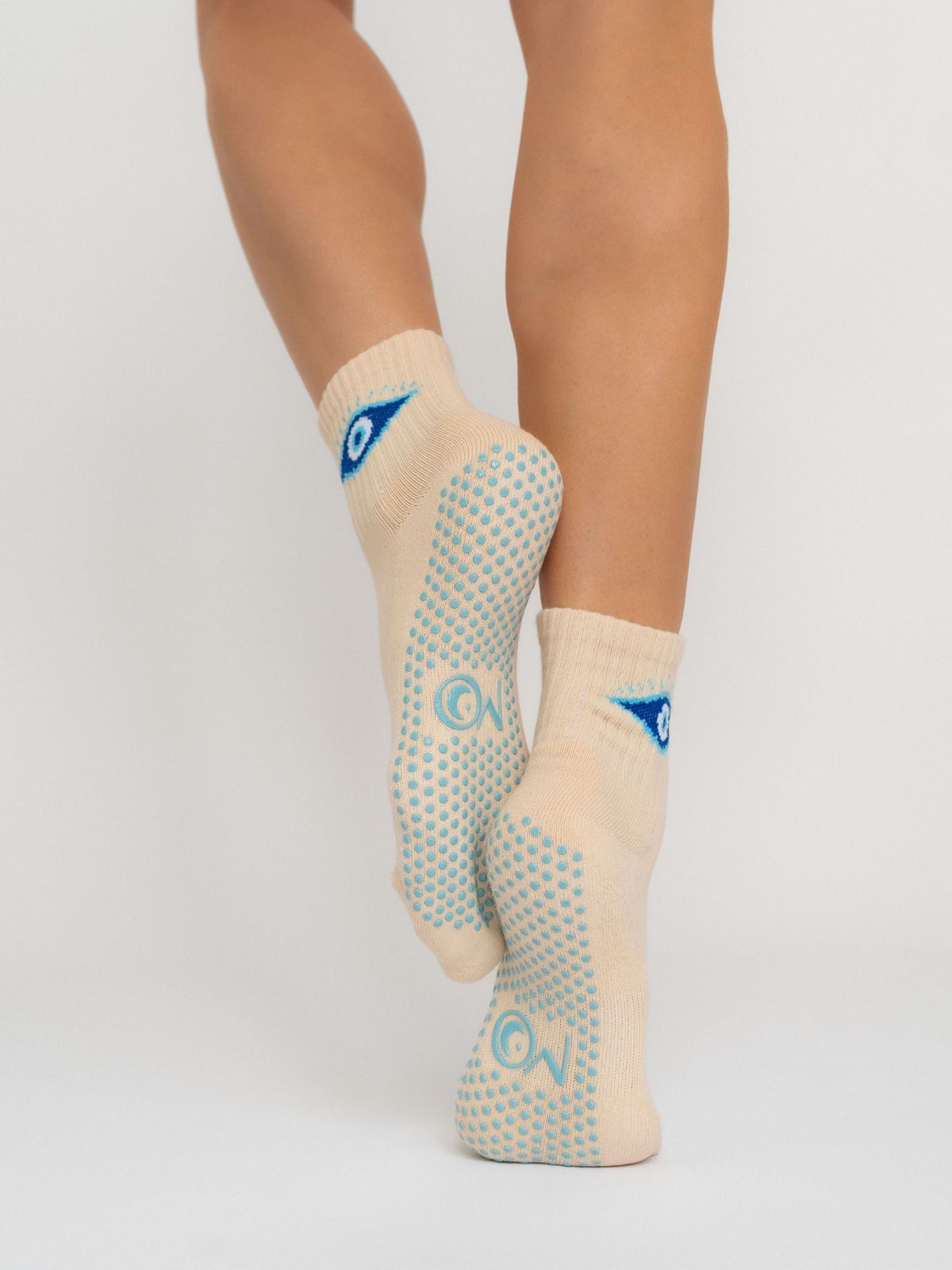 Women's evil eye logo Pilates and yoga creamy non-slip grip socks