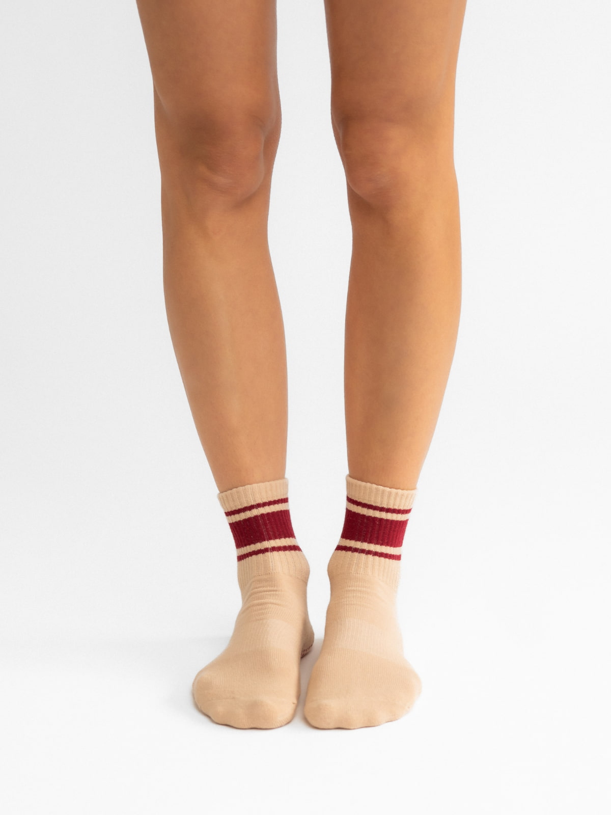Grip socks for Pilates and yoga – almond color with red lines
